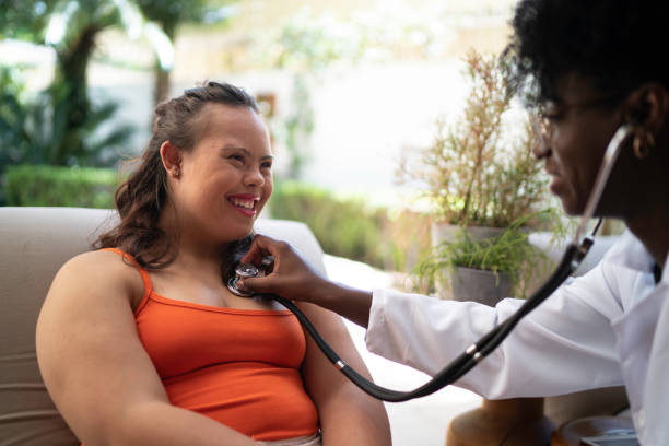 Special needs woman being examining